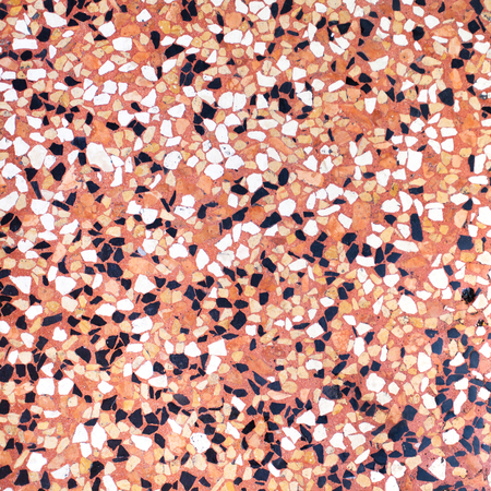 Closeup of trendy coloured living coral, orange and black abstract mosaic ceramic tiles patterned backgroundの写真素材