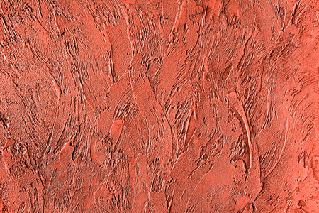 Trendy living coral colored textured background for concept or productの写真素材
