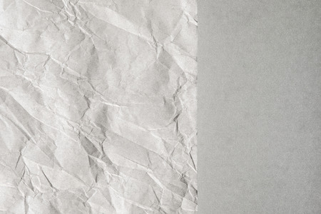 Crumpled and plain paper sheets. Neutral colored abstract background design.の写真素材