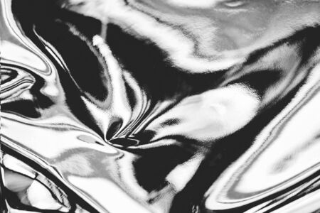 Abstract black and white fluid art background. Real holographic metallic foil texture with scratches and irregularities.の写真素材