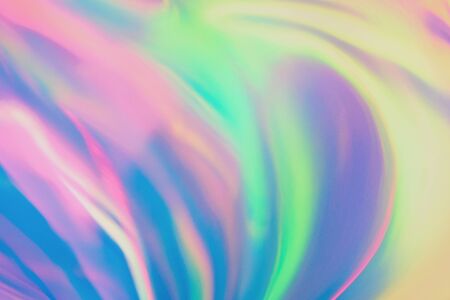 Abstract trendy holographic background in 80s style. Blurred texture in violet, pink and mint...