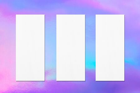 Three empty price-list or menu mock ups with soft shadows on holographic background. Flat lay, top...