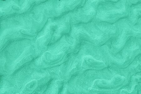 A top down shot of trendy mint toned river sand bottom full of texture and salt marks. Useful as...