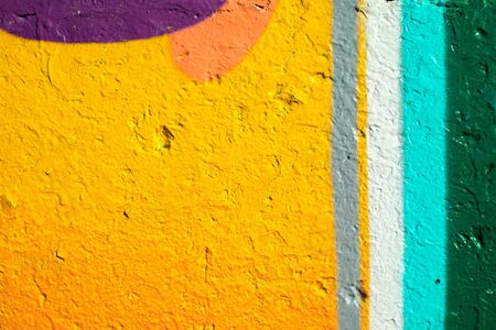 Closeup of colorful urban wall texture. Modern pattern for wallpaper design. Creative urban city background. Abstract open composition.の写真素材