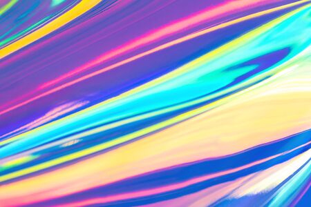 Blurred texture in violet, pink and mint colors. Abstract trendy holographic background in 80s style. Synthwave. Vaporwave style. Retrowave, retro futurism, webpunkの写真素材