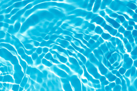 transparent blue colored clear calm water surface texture