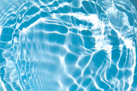 transparent blue colored clear calm water surface texture