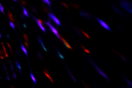colorful neon light leaks on black background