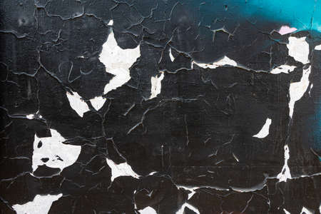 close up of colorful messy painted urban wall texture