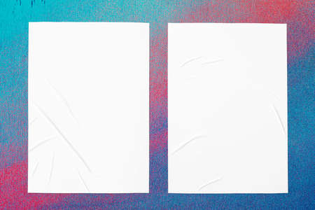 colorful urban wall texture with two wrinkled glued poster templates