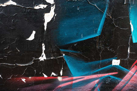 close up of colorful messy painted urban wall texture