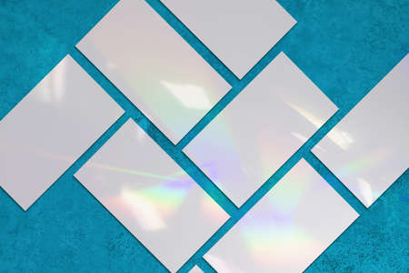 Empty white rectangle poster mockups with diagonal shadowの写真素材