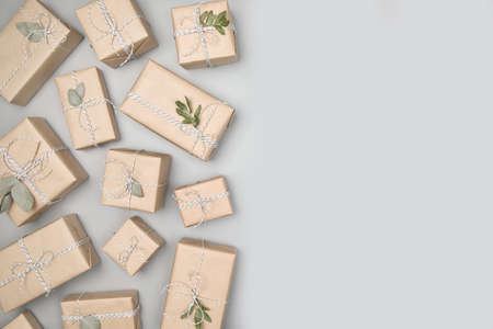 Small gift boxes on solid gray backgroundの写真素材