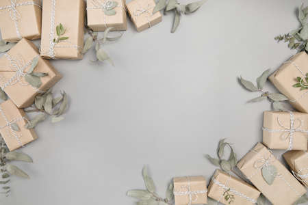 Small gift boxes on solid gray backgroundの写真素材