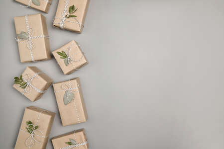 Small gift boxes on solid gray backgroundの写真素材