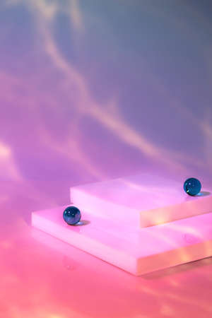 empty scene with square podium on holographic pink backgroundの写真素材