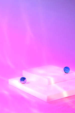 empty scene with square podium on holographic pink backgroundの写真素材