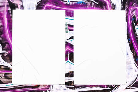 colorful urban wall texture with two wrinkled glued poster templates