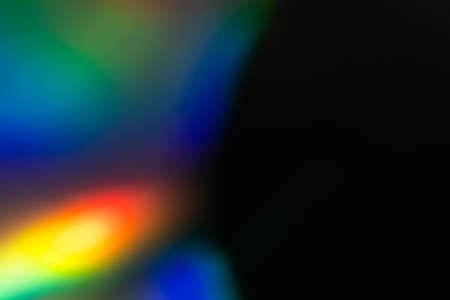 colorful rainbow crystal light leaks on black background