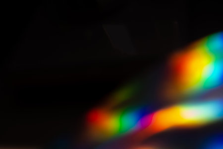 colorful rainbow crystal light leaks on black background