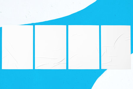colorful urban wall texture with four wrinkled glued poster templatesの写真素材