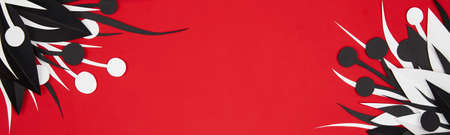 red banner with white and black floral paper decorの写真素材