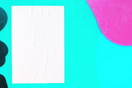 colorful urban wall with wrinkled glued poster templateの写真素材