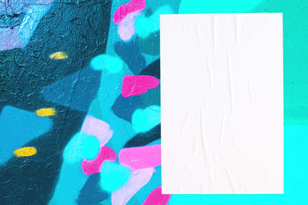 colorful urban wall with wrinkled glued poster templateの写真素材