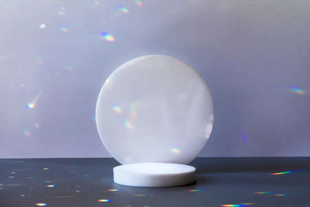 circle podium on gray background with crystal light sparklesの写真素材
