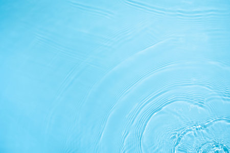 transparent blue colored clear calm water surface texture