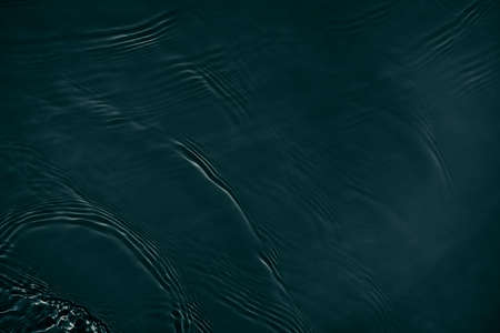 black transparent clear calm water surface texture
