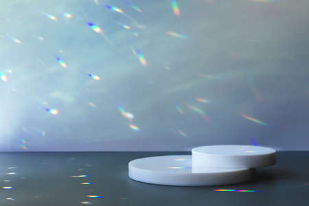 circle podiums on gray background with crystal light sparklesの写真素材