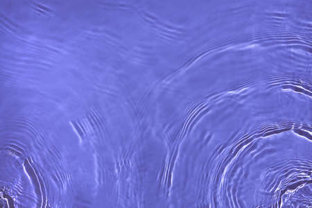 transparent purple colored clear calm water surface texture