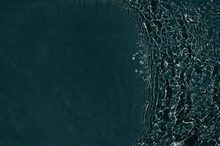 black transparent clear calm water surface textureの写真素材