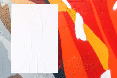 colorful urban wall texture with wrinkled glued poster templateの写真素材