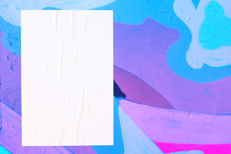 colorful urban wall with wrinkled glued poster template