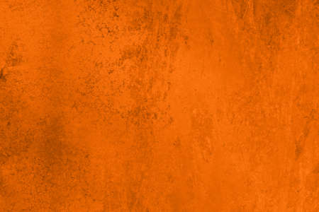 Saturated pastel orange low contrast Concrete textured backgroundの写真素材