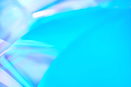 Abstract blurred mint holographic metallic foil background with copy spaceの写真素材