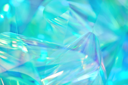 pastel neon mint, turquoise, blue, green holographic metallic foil backgroundの写真素材