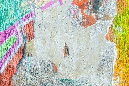 Colorful Weathered Wall Texture with 80s Pastel Flairの写真素材