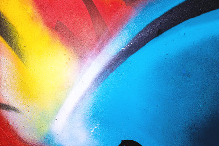 Bold Graffiti Wall Art in Blue, Red, Yellow with 90s Street Style Vibesの写真素材