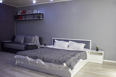 Comfortable white bed in the roomのeditorial素材