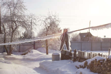 In the countryside there is a strong frost it is cold everything is covered with snow and frost