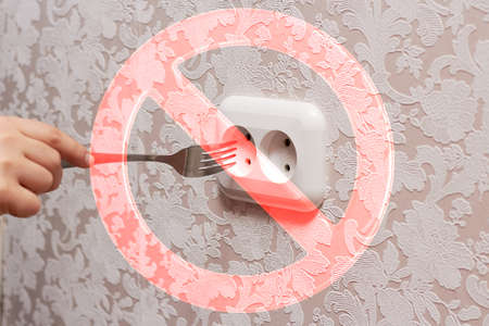The person inserting the plug into an electrical socket is dangerous, it is dangerous to life. Stop...