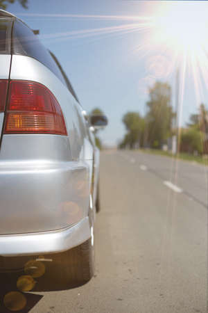 The car is standing on an asphalt road concept in the way, life is a road.の写真素材