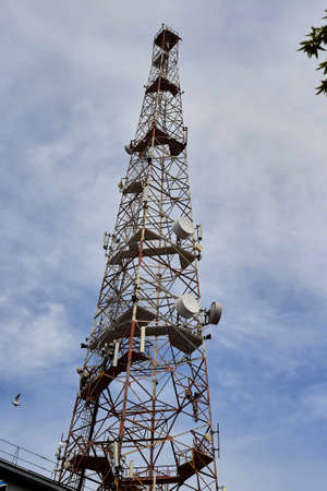 Urban Metal Cellular Antenna, Signal Tower this is the modern world.の写真素材