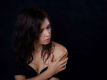 A photo shoot of a model in a black key is beautiful and stylish.