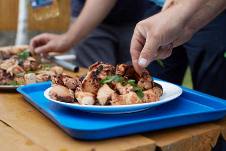 The chef decorates the dish with a barbecue cooked on the grill, a fun weekend.の写真素材