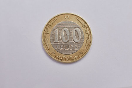 One euro coin on a white background. Close-up shot.