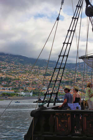 People on the frigate look at the coast of Madeiraのeditorial素材